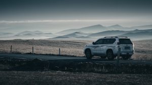 An Suv Car Parked Near the Field
